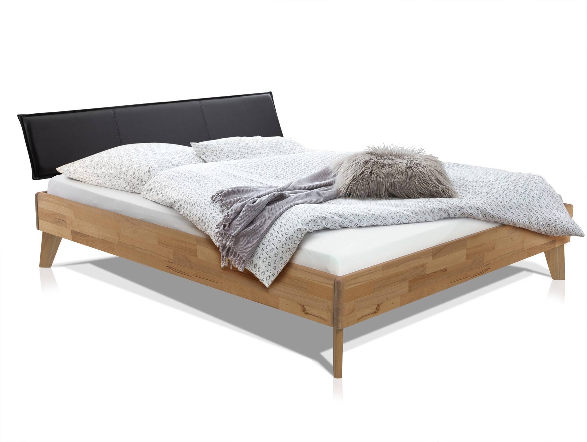 CALIDO 4-Fuß-Bett mit Polster-Kopfteil, Material Massivholz 90 x 200 cm | Eiche geölt | Kunstleder Schwarz | Standardhöhe