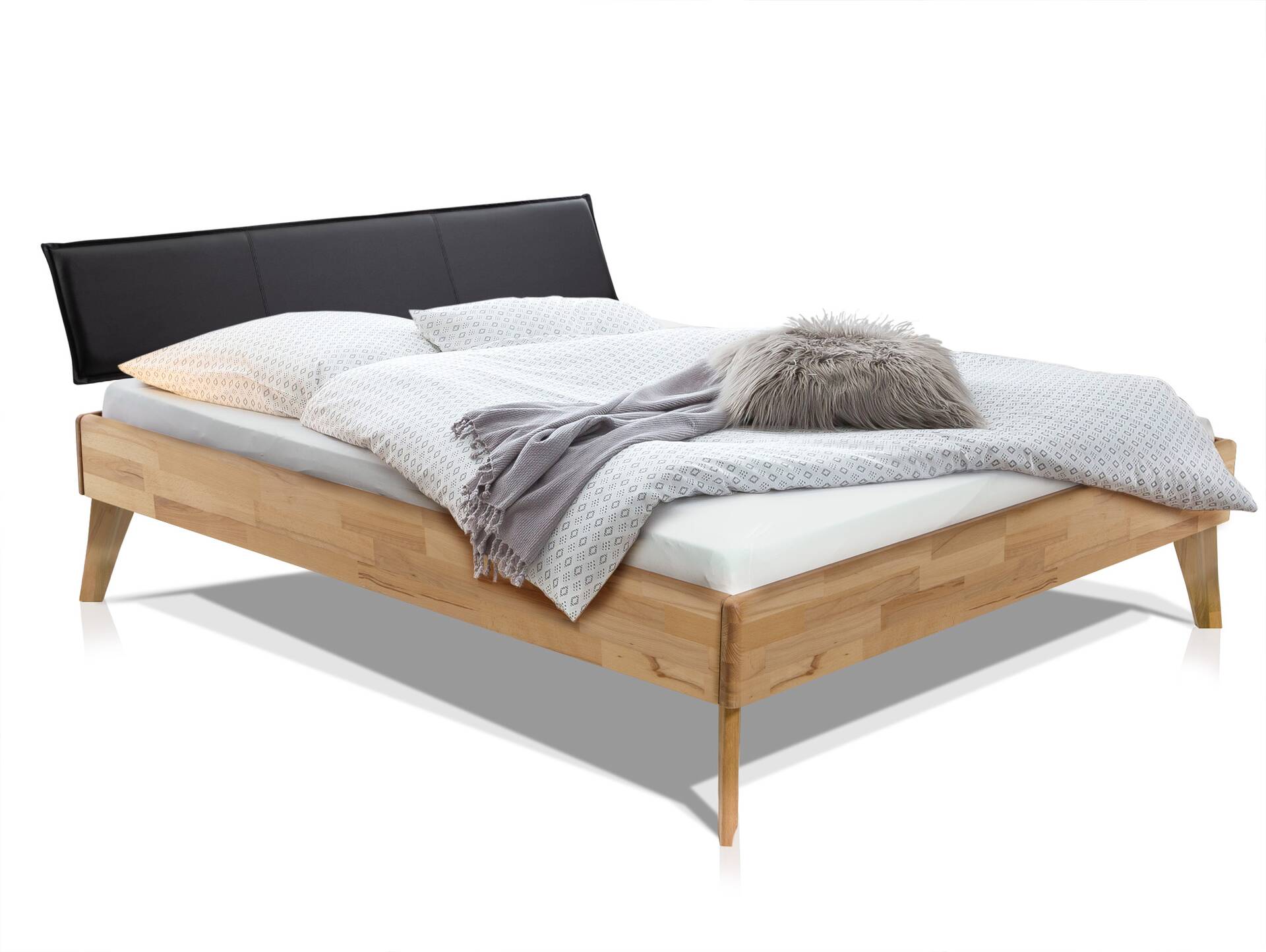 CALIDO 4-Fuß-Bett mit Polster-Kopfteil, Material Massivholz 180 x 220 cm | Eiche geölt | Kunstleder Schwarz | Komforthöhe