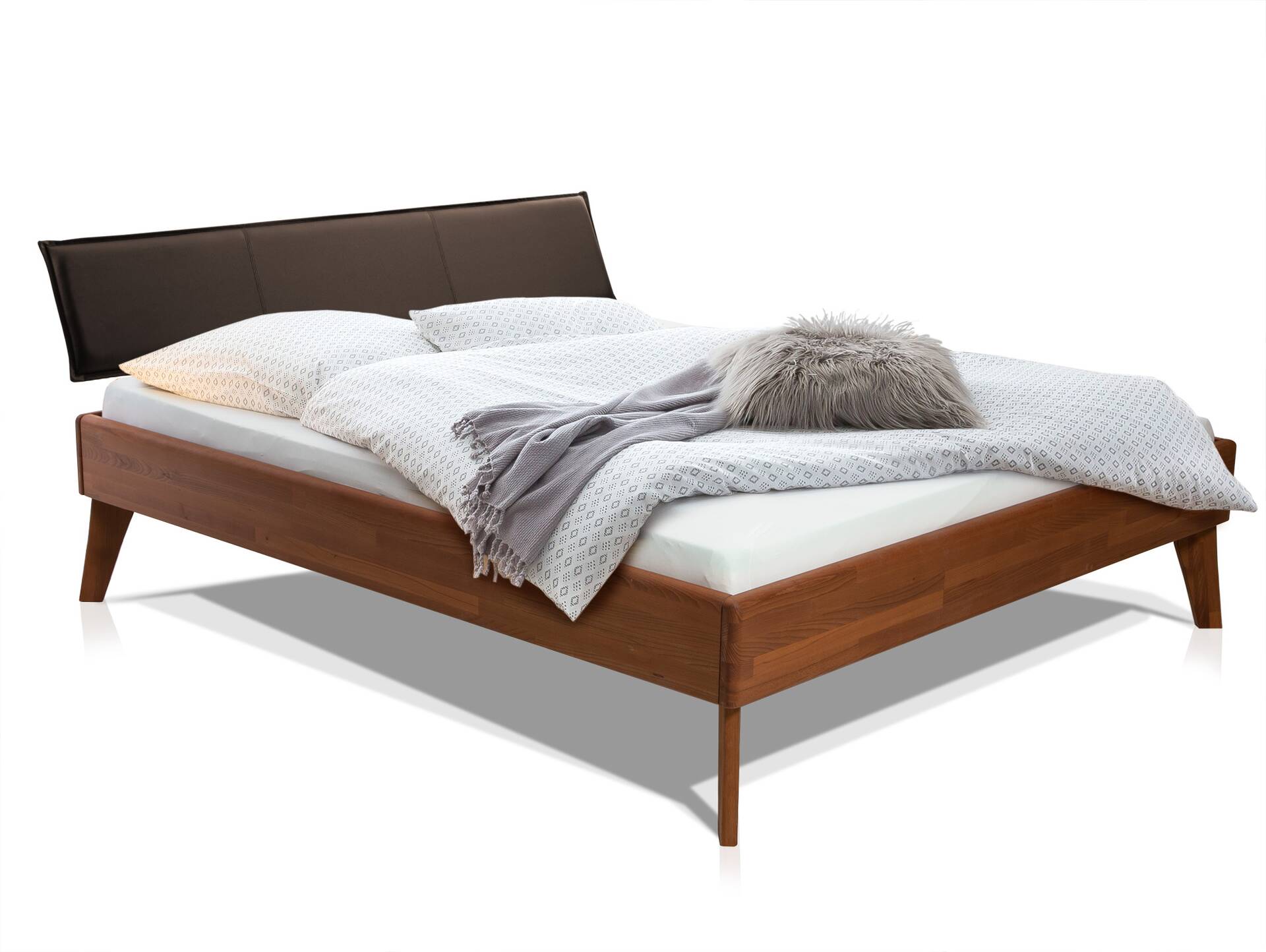 CALIDO 4-Fuß-Bett mit Polster-Kopfteil, Material Massivholz 180 x 220 cm | Buche nussbaumfarbig gedämpft | Kunstleder Braun | Komforthöhe