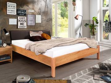 MERANO 4-Fuß-Massivholzbett mit Polsterkopfteil 120 x 200 cm | Buche unbehandelt | Kunstleder Braun ohne Steppung