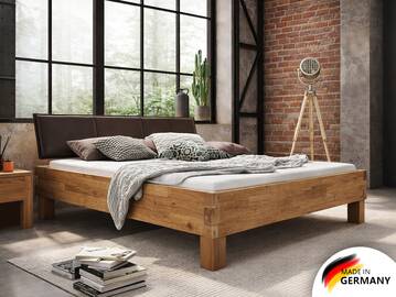 CORDINO 4-Fuß-Bett aus Eiche mit Polsterkopfteil, Material Massivholz