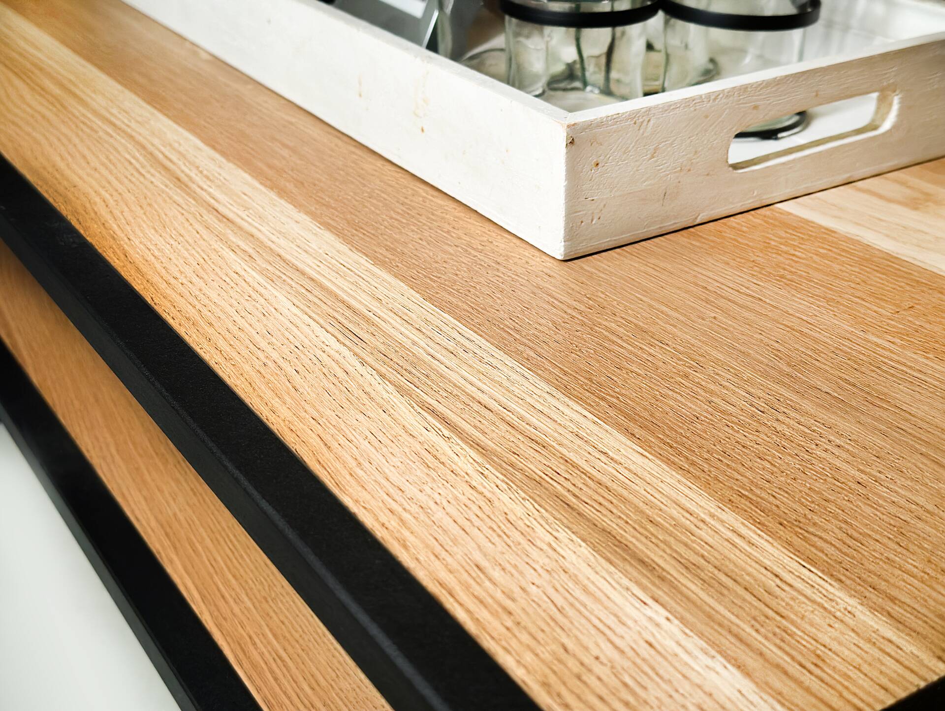 IOLA Couchtisch,  Material Massivholz/Metall, Eiche geölt/schwarz 