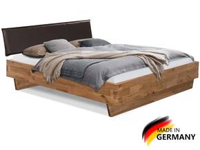 CORDINO Wangenbett aus Eiche mit Polster-Kopfteil, Material Massivholz