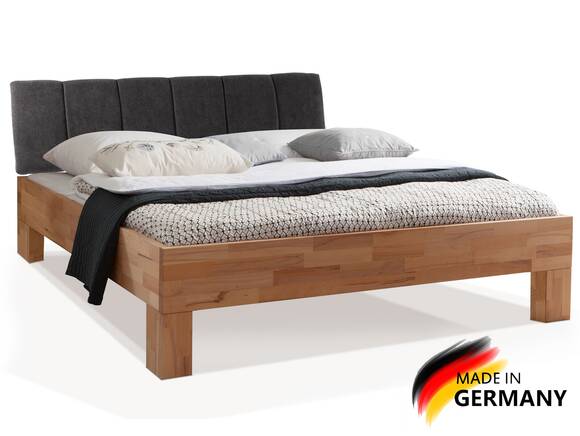 LÖWEN 4-Fuß Massivholzbett mit gestepptem Kopfteil