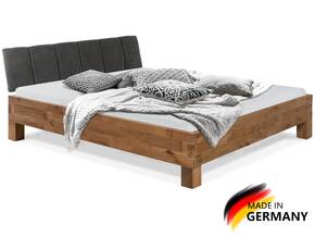 CORDINO 4-Fuß-Bett aus gebürsteter Eiche mit gestepptem Stoff-Kopfteil, Material Massivholz
