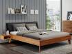CALIDO 4-Fuß-Bett mit Polster-Kopfteil, Material Massivholz, Buche nussbaumfarbig gedämpft